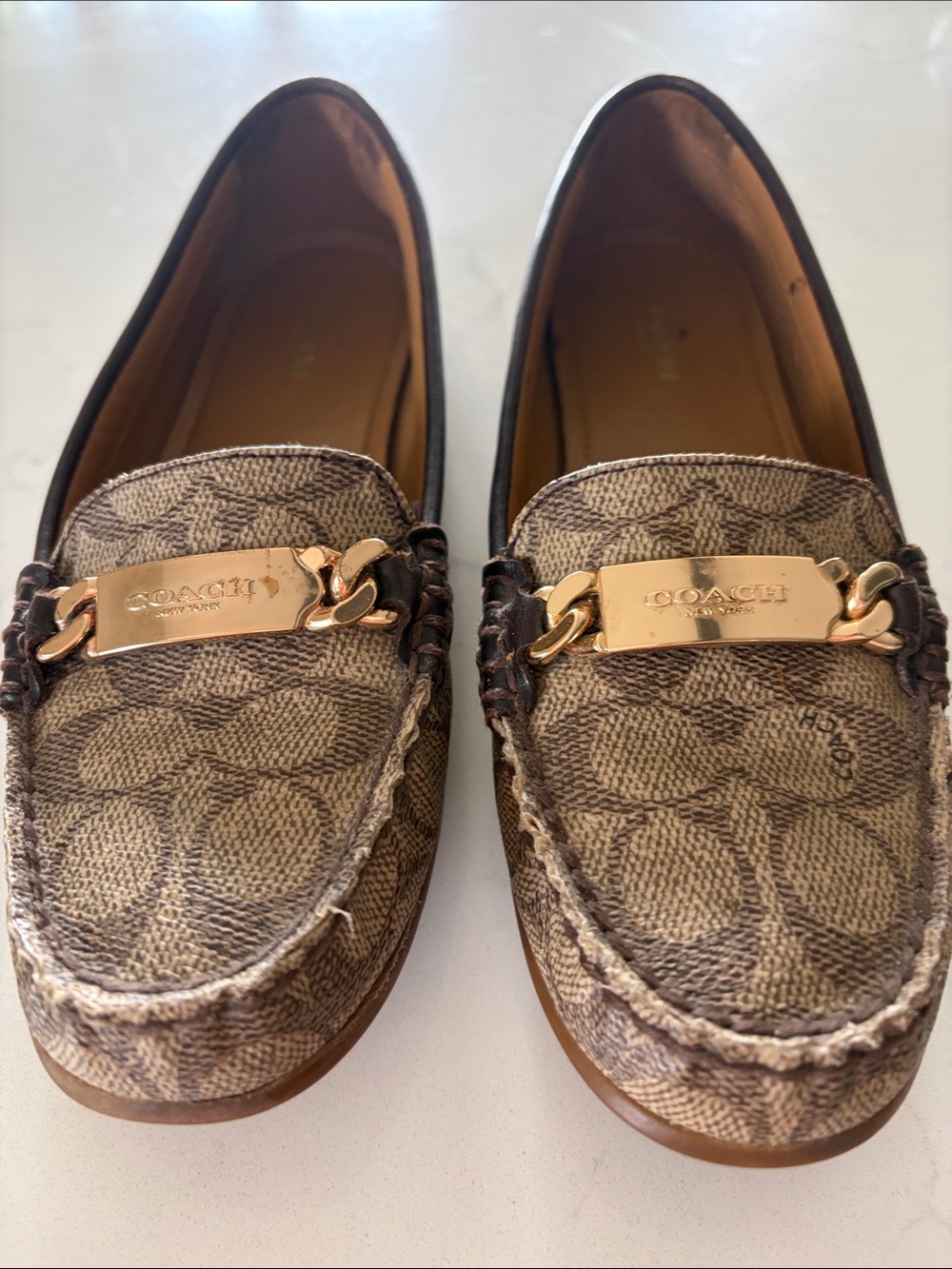 COACH Brown Signature Canvas Loafers with Gold Plaque